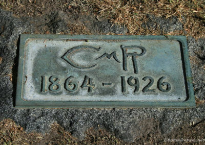 September picture of the metal marker of Charles Marion Russell in the Highland Cemetery in Great Falls, Montana. Image is from the Great Falls Montana Picture Tour.