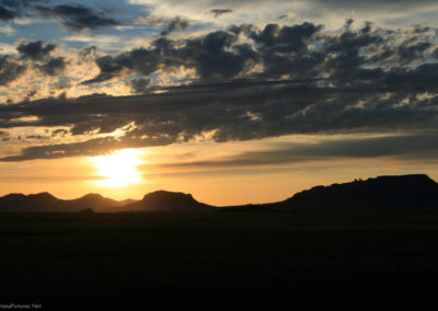 July picture of a sunset over Square Butte near Square Butte Montana. Image is from the Geraldine and Square Butte Montana Picture Tour.