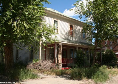 A June picture of an old home in the Forsyth Montana Residential Historic District Image is from the Forsyth Montana Picture Tour.