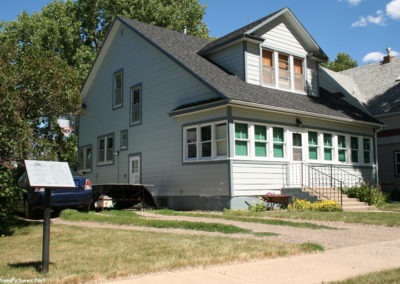 A June picture of the “Bachelor” home in the Forsyth Montana Residential Historic District Image is from the Forsyth Montana Picture Tour.