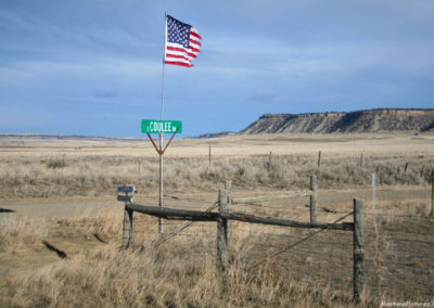 January picture of The Coulee Road Sign on Highway 300. Image is from the Ryegate Montana Picture Tour.